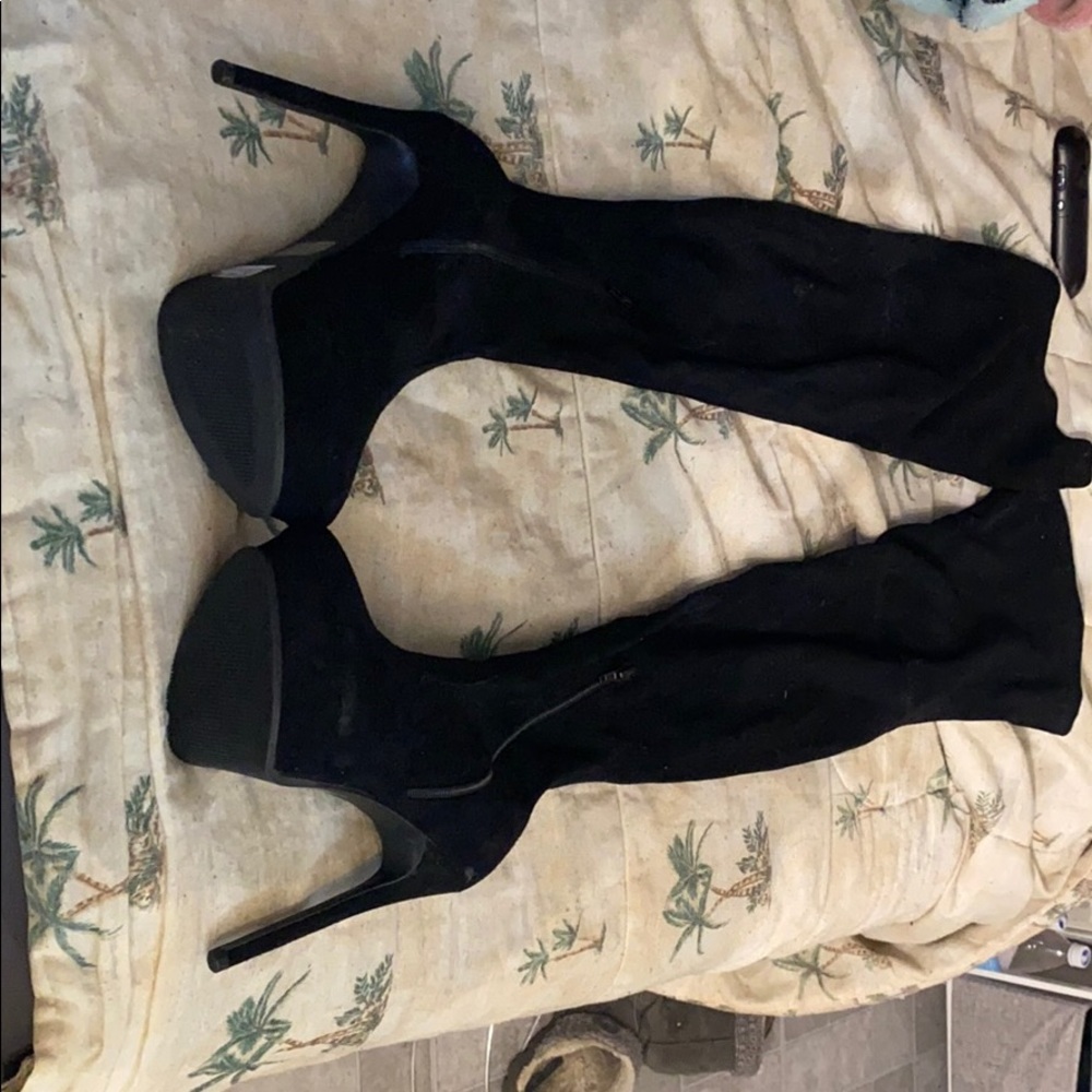 Thigh high heeled boots